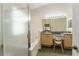 Bathroom features dual sinks, a vanity area, and a separate shower and tub at 777 Summit Greens Blvd, Clermont, FL 34711