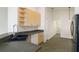 Bright kitchen area featuring stainless steel appliances, light wood cabinets, and durable countertops at 777 Summit Greens Blvd, Clermont, FL 34711