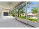 Enclosed lanai with tile flooring and ceiling fan, offering a seamless indoor-outdoor living experience at 777 Summit Greens Blvd, Clermont, FL 34711