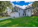 Inviting home with a pristine lawn, two-car garage, and an appealing two-story facade at 1839 Cranberry Isles Way, Apopka, FL 32712