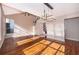Bright living room with high ceilings, modern lighting, and hardwood flooring at 1839 Cranberry Isles Way, Apopka, FL 32712