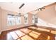 Spacious living room filled with natural light, featuring a modern ceiling fan at 1839 Cranberry Isles Way, Apopka, FL 32712