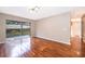 Sun-filled living room with sliding glass doors to private backyard at 1839 Cranberry Isles Way, Apopka, FL 32712
