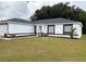 Charming one-story home with a well-maintained lawn, fresh exterior paint and an inviting entrance at 5356 Spivey Glen Ct, Lakeland, FL 33810