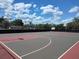 Outdoor basketball court for sports enthusiasts, featuring hoops and a well-maintained surface at 535 Midway Dr # A, Ocala, FL 34472