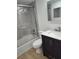 Bathroom with sleek vanity and shower over tub, offering a refreshing and modern design at 535 Midway Dr # A, Ocala, FL 34472