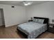 This spacious bedroom has a ceiling fan, and features modern flooring, offering comfort and style at 535 Midway Dr # A, Ocala, FL 34472
