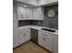 Beautifully renovated kitchen with stylish cabinetry, modern appliances, and a sleek stainless steel sink at 535 Midway Dr # A, Ocala, FL 34472