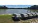 Community lake with small fishing boats for resident use, surrounded by natural beauty at 535 Midway Dr # A, Ocala, FL 34472