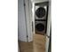Convenient laundry area featuring a stacked washer and dryer unit for efficient space-saving at 535 Midway Dr # A, Ocala, FL 34472