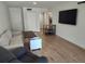 Spacious living room with hardwood floors and ample seating at 535 Midway Dr # A, Ocala, FL 34472