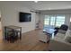 Bright living room with modern sliding doors and contemporary furnishings at 535 Midway Dr # A, Ocala, FL 34472