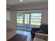 Sun room with a view of pool and seating area at 535 Midway Dr # A, Ocala, FL 34472
