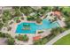 Aerial view of pool oasis, lush landscape and resort-style amenities abound in this luxurious community at 6185 Sw 89Th Ct, Ocala, FL 34481