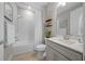 Clean and bright bathroom with a tub and shower combination and modern vanity with quartz countertop at 6185 Sw 89Th Ct, Ocala, FL 34481