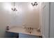 Powder room featuring vanity, faucet, and fixtures at 1695 Horseshoe Rd, Deltona, FL 32725