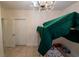 Bedroom with a bunk bed and carpet, under a chandelier at 1695 Horseshoe Rd, Deltona, FL 32725