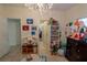 bedroom featuring play kitchen, dresser, and chandelier at 1695 Horseshoe Rd, Deltona, FL 32725