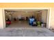 Large garage featuring ample space for storage, tools, and parking, accessible from a wide, open door at 1695 Horseshoe Rd, Deltona, FL 32725