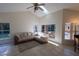 Spacious living room with natural light and access to outdoor living at 1695 Horseshoe Rd, Deltona, FL 32725