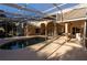 Expansive pool area featuring a large screened-in enclosure, providing a private outdoor retreat at 1695 Horseshoe Rd, Deltona, FL 32725