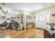 Welcoming entryway featuring light walls, hardwood floors, and a charming decor at 9107 Sw 102Nd Cir, Ocala, FL 34481