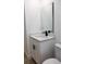 Bathroom featuring new vanity and mirror with stylish matte black hardware at 991 Polk St, Bartow, FL 33830