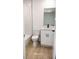 Cozy bathroom featuring new vanity with stylish fixtures and bright white subway tile at 991 Polk St, Bartow, FL 33830