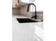 A close up on a luxurious kitchen countertop at 991 Polk St, Bartow, FL 33830