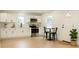 New kitchen with stainless appliances, white cabinets and an eat-in breakfast nook at 991 Polk St, Bartow, FL 33830
