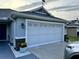 Close up of the garage door highlighting exterior paint at 10470 Sw 132Nd Ct, Dunnellon, FL 34432