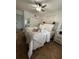 Cozy bedroom with a comfortable bed, stylish decor, and abundant natural light at 211 Crown Oaks Way, Longwood, FL 32779