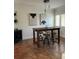 Modern dining area with stylish furniture and contemporary decor, creating an inviting space at 211 Crown Oaks Way, Longwood, FL 32779