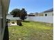 Spacious backyard featuring a white fence and patio area at 31517 Broadwater Ave, Leesburg, FL 34748