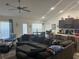 Spacious living room with vaulted ceilings and an open floor plan create an inviting gathering space at 31517 Broadwater Ave, Leesburg, FL 34748