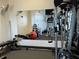 Weight machines and equipment in a community gym with mirror, TV, and free weights at 690 Osceola Ave # 405, Winter Park, FL 32789