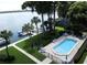 Aerial view of the community pool area, close to boat slips on the lake at 690 Osceola Ave # 405, Winter Park, FL 32789
