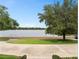 Home featuring a lake front view at 1410 Poinsettia Ave, Orlando, FL 32804