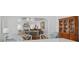 Open-concept living room with a view through to the dining and living spaces at 1410 Poinsettia Ave, Orlando, FL 32804