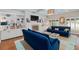 Comfortable living room with blue sofas, fireplace, and built-in shelving at 1410 Poinsettia Ave, Orlando, FL 32804