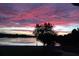 Breathtaking sunset view over the lake, with vibrant colors painting the sky, creating a serene ambiance at 1410 Poinsettia Ave, Orlando, FL 32804