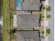 Aerial view of the property showcasing the roof, patio, landscaping, and surrounding neighborhood at 1896 Napoli Dr, St Cloud, FL 34771