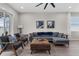 Bright living area with hardwood floors, neutral walls and comfortable furniture at 1896 Napoli Dr, St Cloud, FL 34771