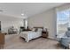 Large main bedroom featuring fan and view to two large windows at 1896 Napoli Dr, St Cloud, FL 34771