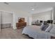 Open main bedroom featuring fan and access to a walk-in closet at 1896 Napoli Dr, St Cloud, FL 34771
