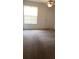 Spacious bedroom with neutral carpet, a window, and a ceiling fan at 1948 Lake Atriums Cir # 132, Orlando, FL 32839