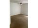 Bedroom with a fan, neutral carpet, and natural light at 1948 Lake Atriums Cir # 132, Orlando, FL 32839