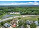 This aerial view showcases the property's location near a beautiful lake, offering scenic views and recreational opportunities at 2641 Delcrest Dr, Orlando, FL 32817