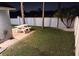 This backyard features a picnic table, a paver patio, and a privacy fence, perfect for entertaining at 2641 Delcrest Dr, Orlando, FL 32817