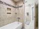 Tiled shower and tub in bathroom at 2641 Delcrest Dr, Orlando, FL 32817